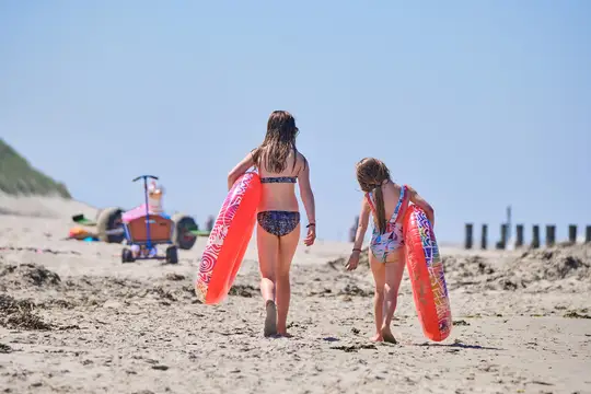 Kind im Sand